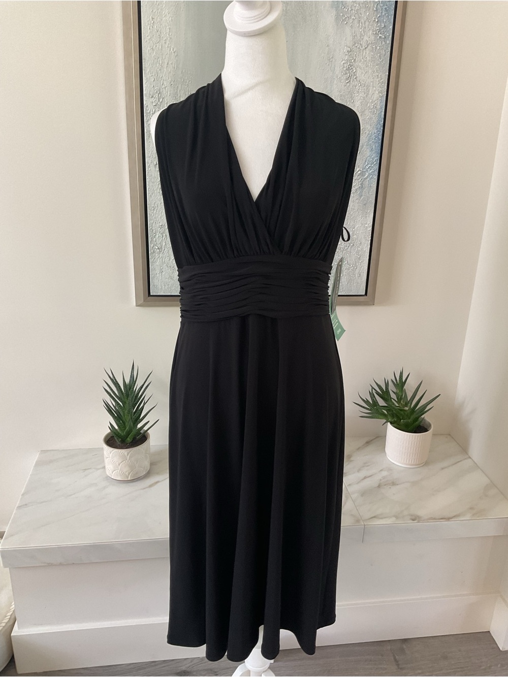 **JONES WEAR DRESS** Gorgeous Black “Day to Dinner” with plunging neckline.